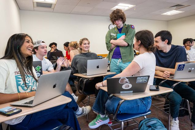 Photo: Students in a college class having a lively discussion
