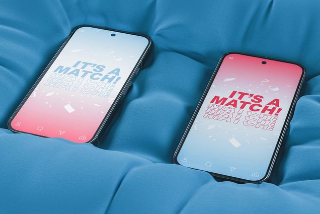 Photo: Sock image of two phones with screens that read ITS A MATCH on blue sheets.