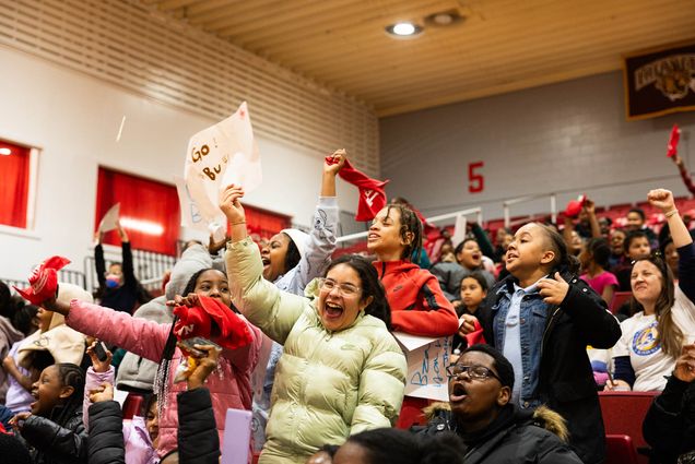 Photo: A crowd of Boston Public School children scream and cheer on BU women's basketball.
