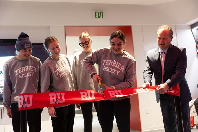 Women’s ice hockey assistant captain Callie Shanahan (COM’25, left), assistant captain Maggie Hanzel (Questrom’25), assistant captain Julia Shaunessy (CAS’24, SPH’25) captain Tamara Giaquinto (Questrom’24, SHA’25) and director of athletics Drew Marrochello at a ribbon cutting inside the new women’s ice hockey locker room at Walter Brown Arena, January 24. The new locker room was part of a complete renovation of the team’s spaces, including a new lounge, coaches’ offices, equipment room and athletic training room. This completed a $13 million project within the Case Center that include the Ike Brown (Questrom’76) Basketball Locker Room, which was unveiled to the men’s basketball team earlier this month along with the Todd & Anne Klipp Video Room, which will be used by both basketball programs. It was the most significant renovation project within an existing Athletics facility in department history. Photo by Matt Woolverton.