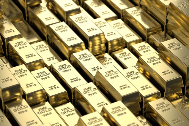 Photo: A stock photo of gold brick in a stack.