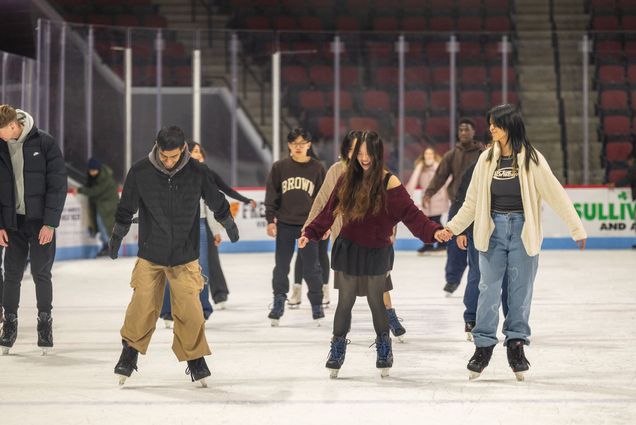 Photo: BU students ice skating at Agganis Arena
