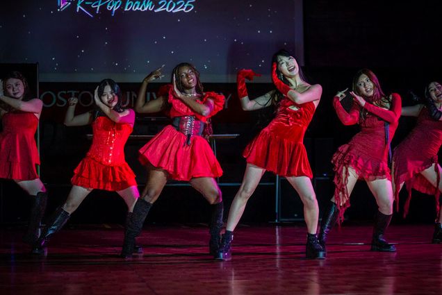 Photo: The miXx K-Pop Cover Dance Crew—Maria Sun (SAR '25), (from left) Nicole Hahn (SAR '26), Tina Phan (QST '25), Layla Brissett (COM '26), Seoyoung Hwang (SAR '27), and Emily Yang (CAS '26)—deliver a captivating performance