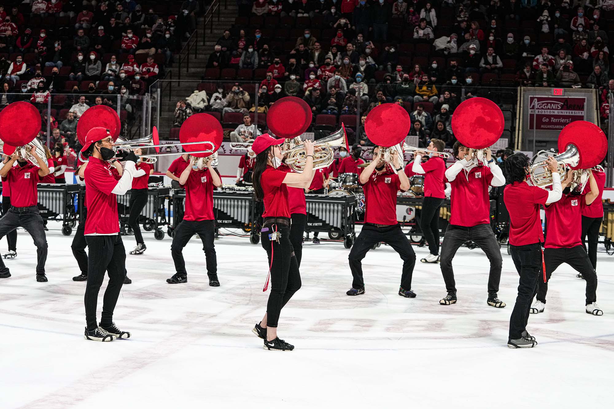 Photo: BU Bands performing on Ice during a BU men's hockey game