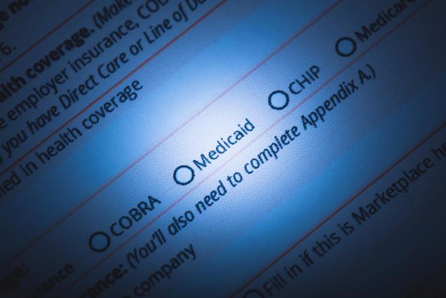 Photo: A stock image of paperwork with an un-circled "Medicaid" option