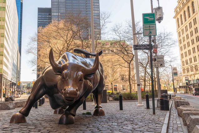Photo: The wall street bull sculpture on a sunny day