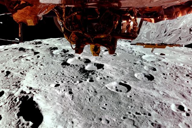 Image of the moon with a spacecraft visible in the foreground