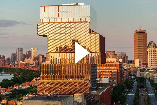 Photo: Stock images of the Boston University campus. A play button overlay sits on the image.