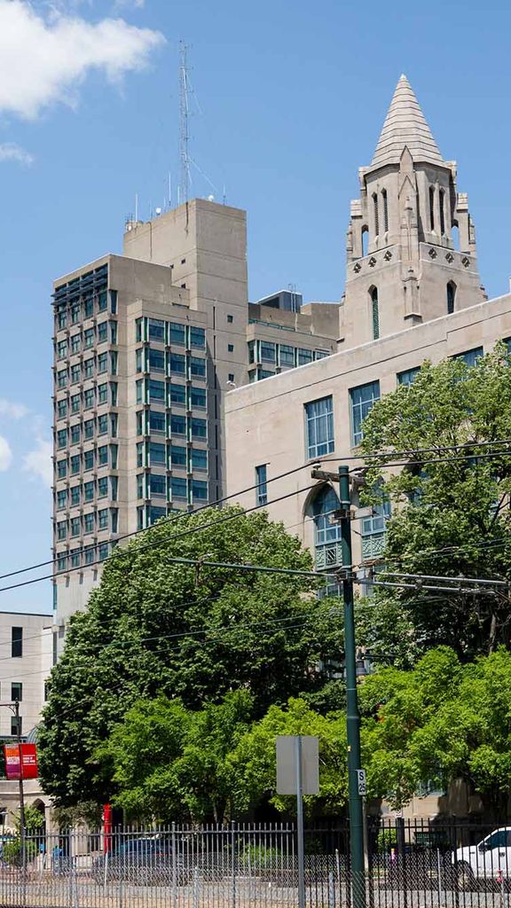 Photo: A stock image of Boston University's campus with bright blue skies and greenery.
