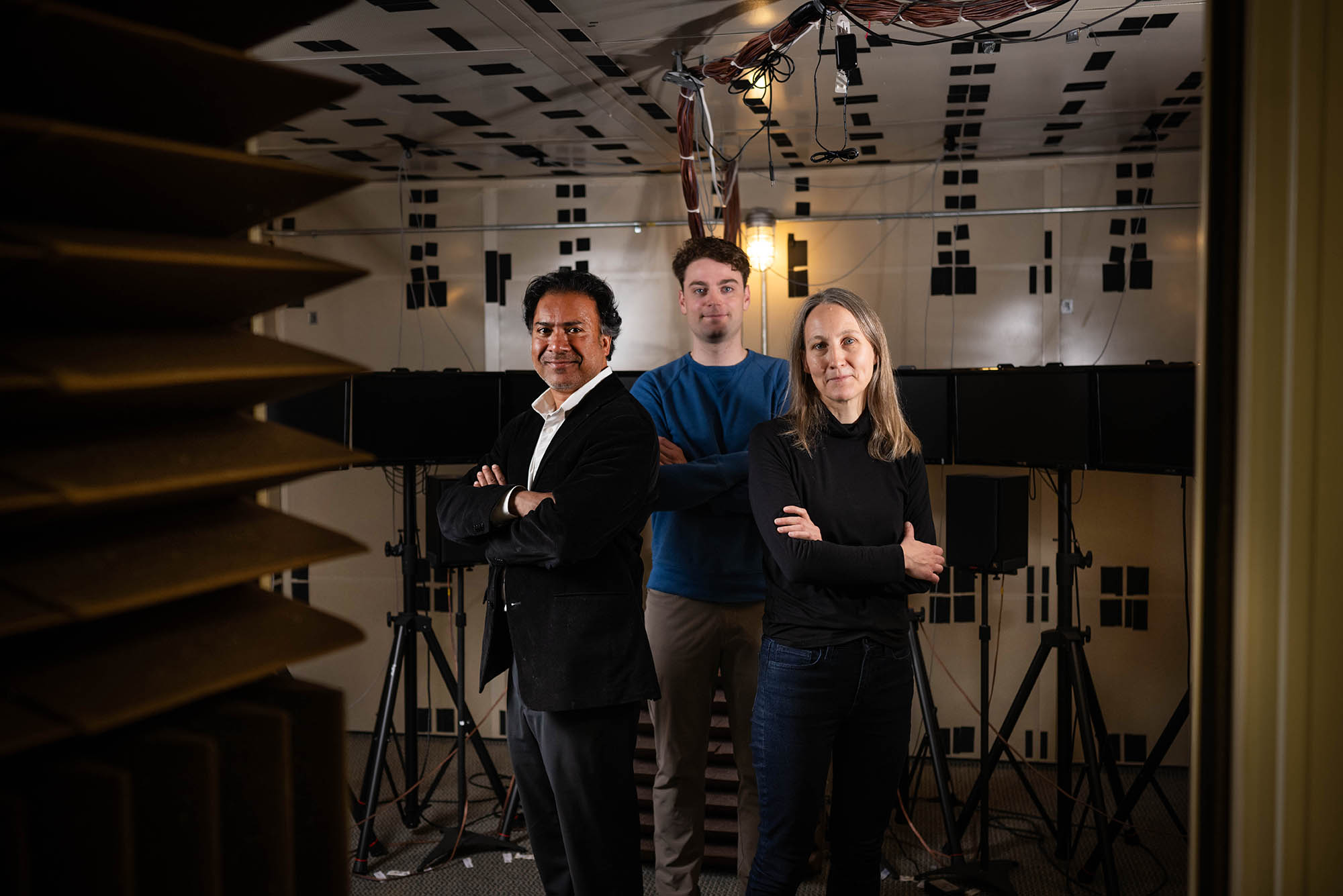 Photo: Three individuals pose for a portrait shot with their arms crossed in a power pose.