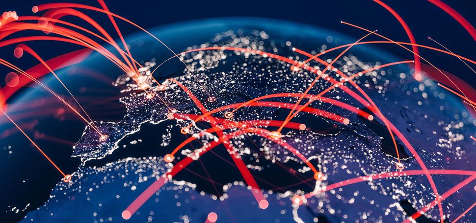 Photo: An illustration of global communication networks, with lines across the globe