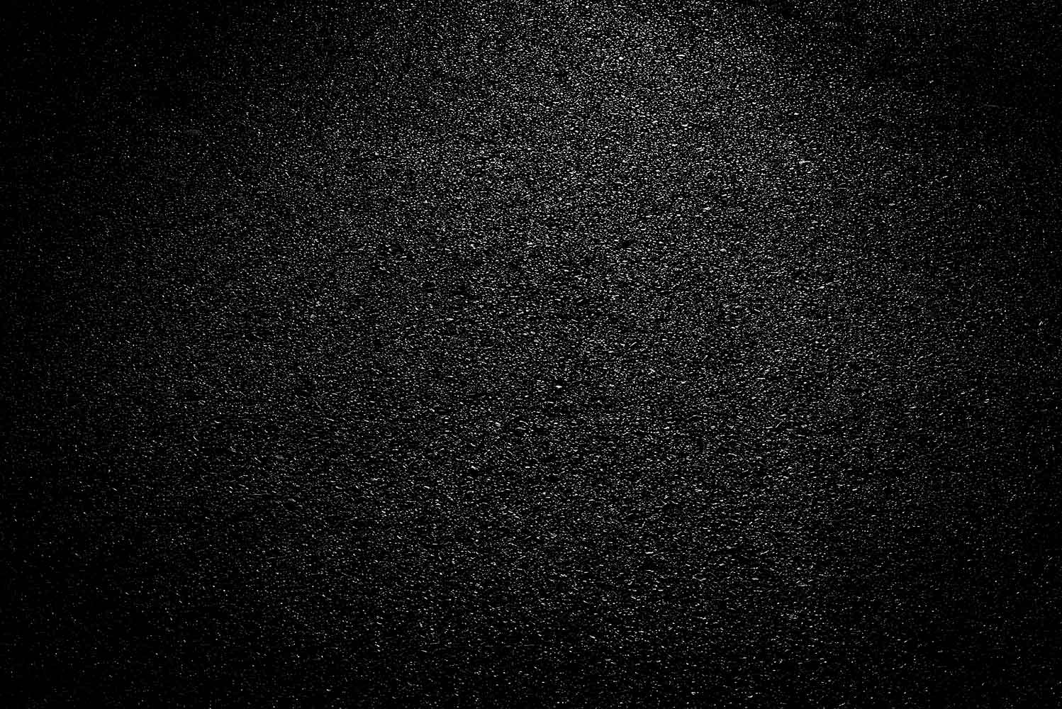 Image: Black background with many tiny white dots that imply a starry night sky.