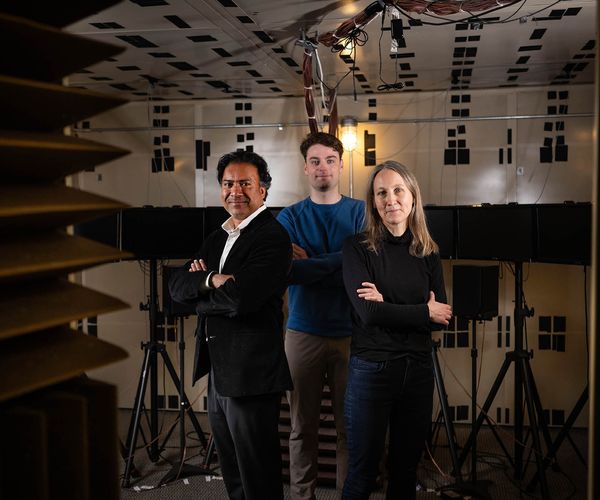 Photo: Three individuals pose for a portrait shot with their arms crossed in a power pose.