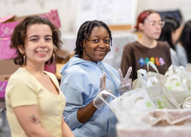 Students volunteering at a food pantry