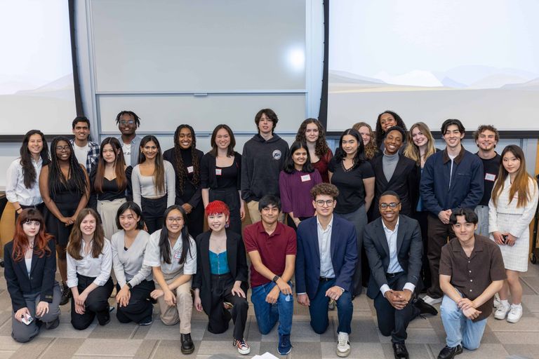 Cohort of students posing for a group photo