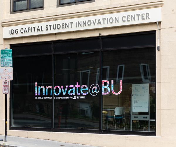 IDG Capital Student Innovation Center signage above a window with Innovate@BU vinyl decal