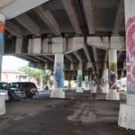 Local artists painted the cement pillars of an expressway built in 1969 that destroyed dozens of African American-owned businesses in New Orleans. This is now a gathering spot for the African American community during Mardi Gras. (Photograph by C. Becker)