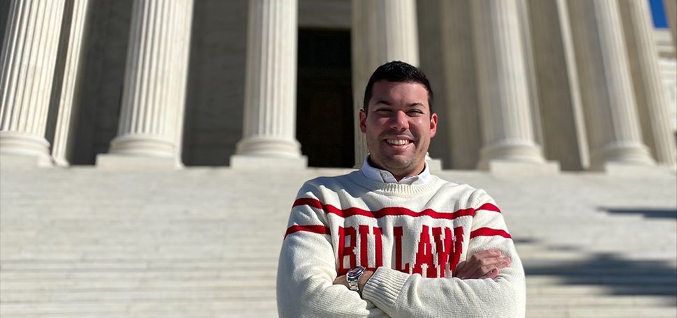 Cesar Lopez-Morales ('14) stands on the steps of the US Supreme Court, where he will clerk for Justice Sonia Sotomayor in 2023-24