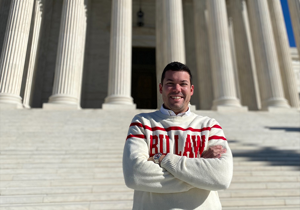 Cesar Lopez-Morales ('14) stands on the steps of the US Supreme Court, where he will clerk for Justice Sonia Sotomayor in 2023-24