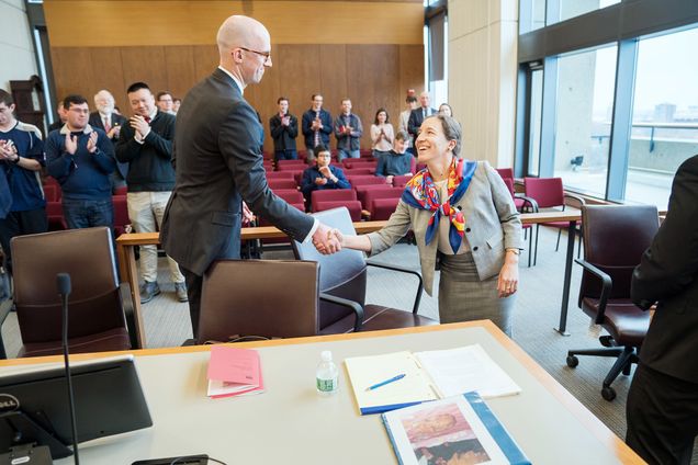 Ian Gillen (´19) and Alexandra Arnold (´19) shake hands after completing their oral arguments.