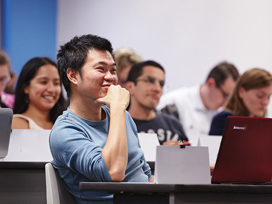 International students engaged in a classroom at Boston University Metropolitan College. Learn more about the international student admissions process.