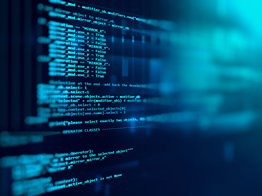 Abstract depiction of code on a computer screen against a blurred background