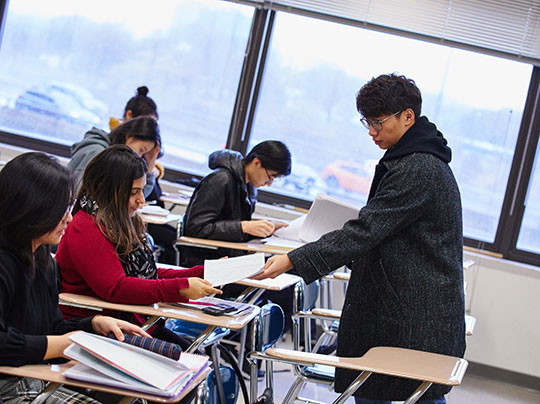 Professor Tepfer working with students at BU MET