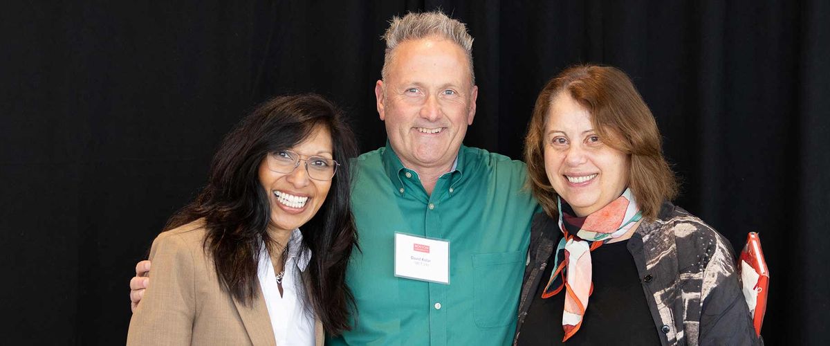 BU employee and MET graduate Dave Kolar poses with speakers at the BU employee graduation reception, including MET Dean Tanya Zlateva