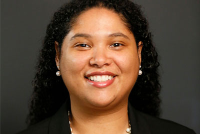 Victoria Sahani in a formal outfit for a headshot