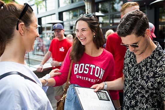 Smiling students at an event