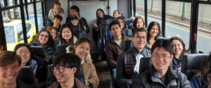 students are on their way to a company visit on a bus