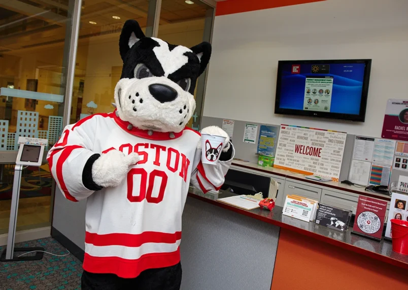 Rhett the mascot poses in the undergrad development center