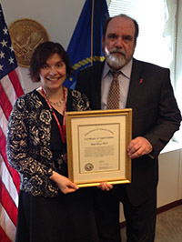 Rani Elwy (left) receives certificate from Robert Jesse, VA Principal Deputy Under Secretary for HealthRani Elwy (left) receives certificate from Robert Jesse, VA Principal Deputy Under Secretary for Health