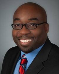 Udom. Lawrence, MD