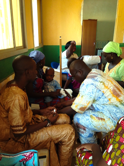 Senegalese teachers testing for malaria