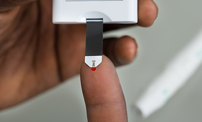 patient-with-glucometer