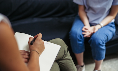 Student talking to therapist