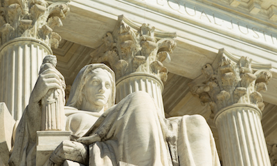 US Supreme Court building detail: statue of a female figure 