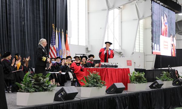 Rachel Levine And Dean Galea on stage at convocation