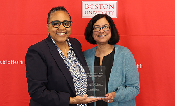 Scarlett Bellamy presents award to Dr Nandita Mitra