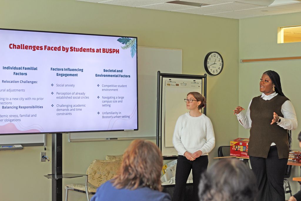 Team Rose begins their pitch for "Social Pulse," a social cohesion program, with a description of the challenges facing students at SPH.