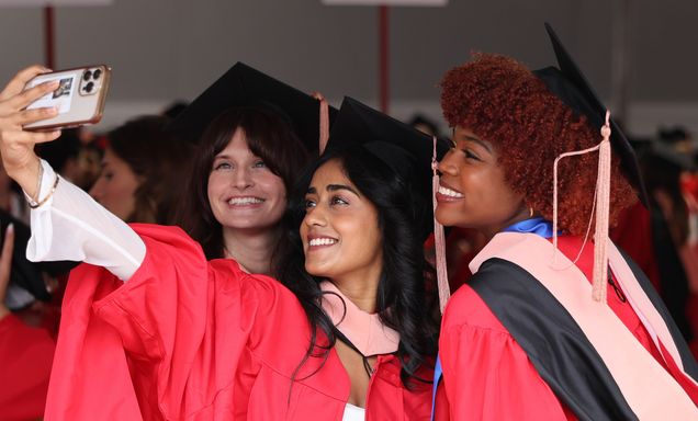 Three graduates take selfie at SPH convocation 2024