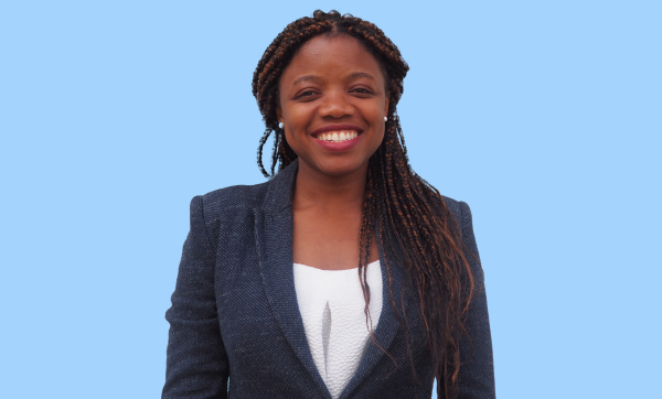 Headshot of Elaine Nsoesie with blue background