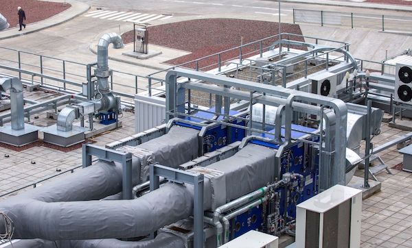 External infrastructure of the microclimate support system at a large industrial site. Air pipelines inlet and exhaust. Fans and air conditioning. Systems of control of pressure, humidity, temperature