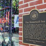 Sign and plaque on the facade of The Stonewall Inn on Christopher Street in Greenwich Village, NYC
