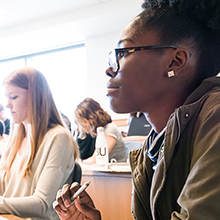  students sit in a classroom 