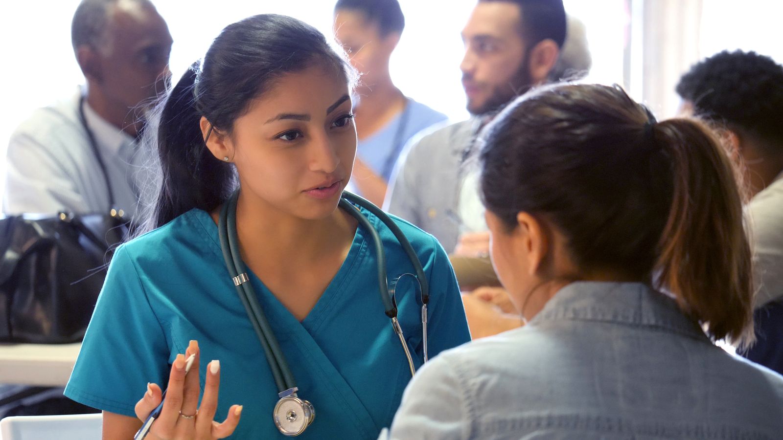 a doctor talking to a patient