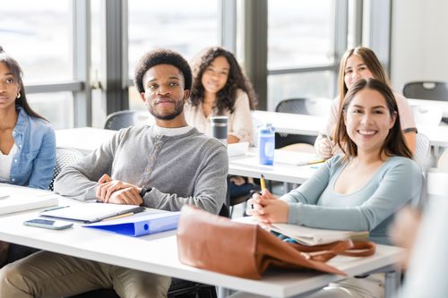 a group of students listening in class