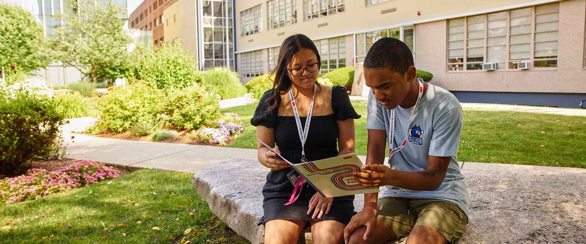 Two Boston University students go over their Introduction to Experimental Psychology syllabus
