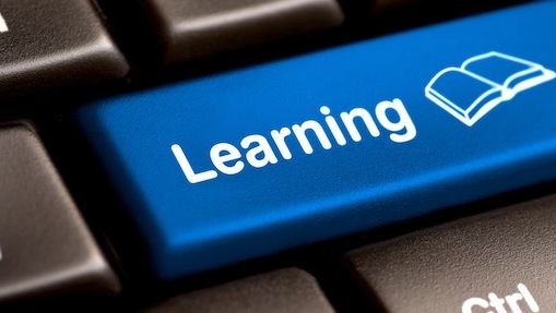e-Learning Concept. Computer Keyboard